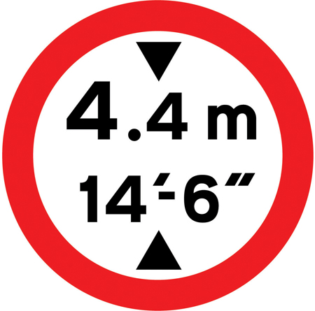 Mandatory circular height restriction sign showing metric and imperial limits